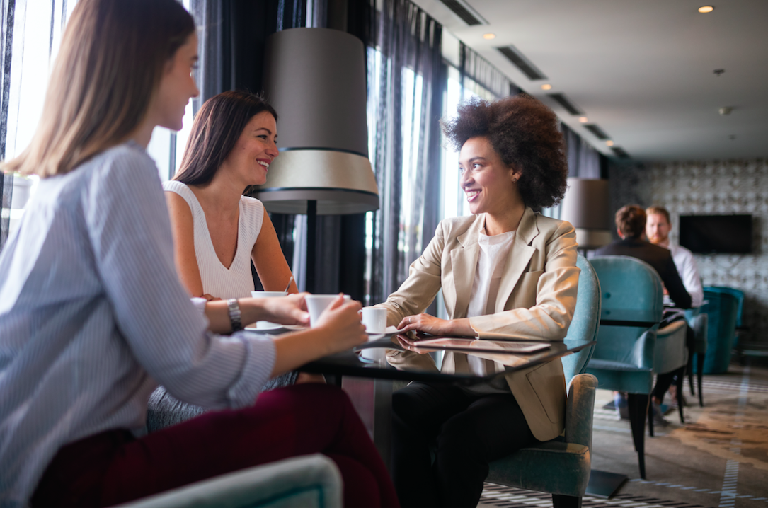 networking three women coffee shop